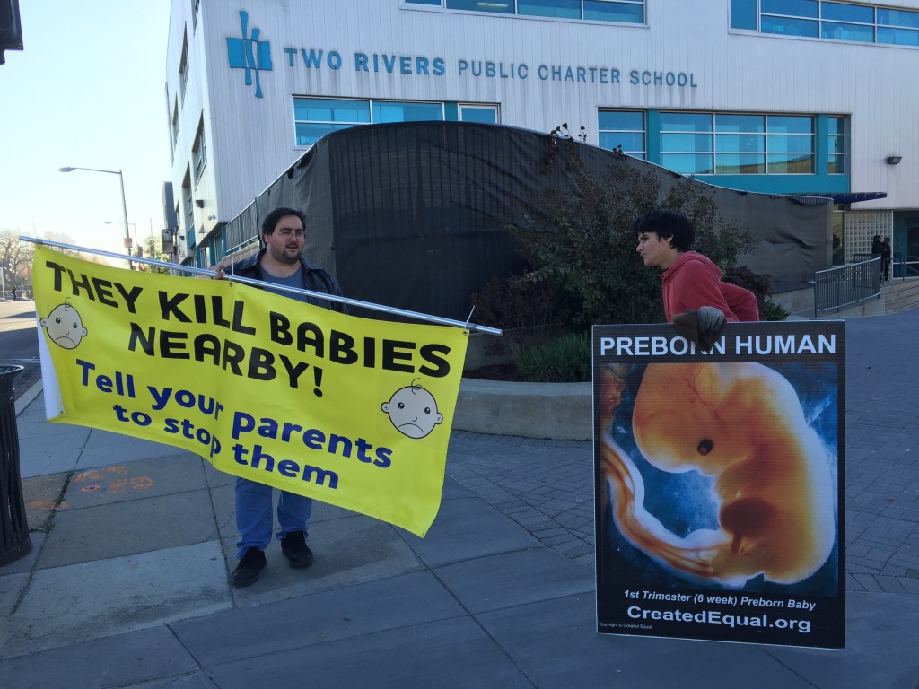 Anti-abortion protesters outside of the Two Rivers Public Charter School, which is next to a new Planned Parenthood facility that is under construction in Washington, D.C., shown here in November 2015. (Courtesy of Two Rivers Public Charter School)